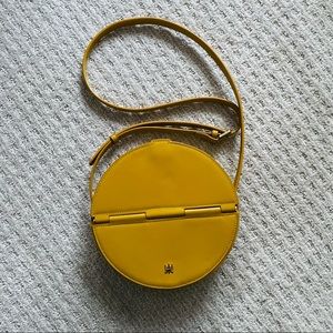 Yellow round shape crossbody bag